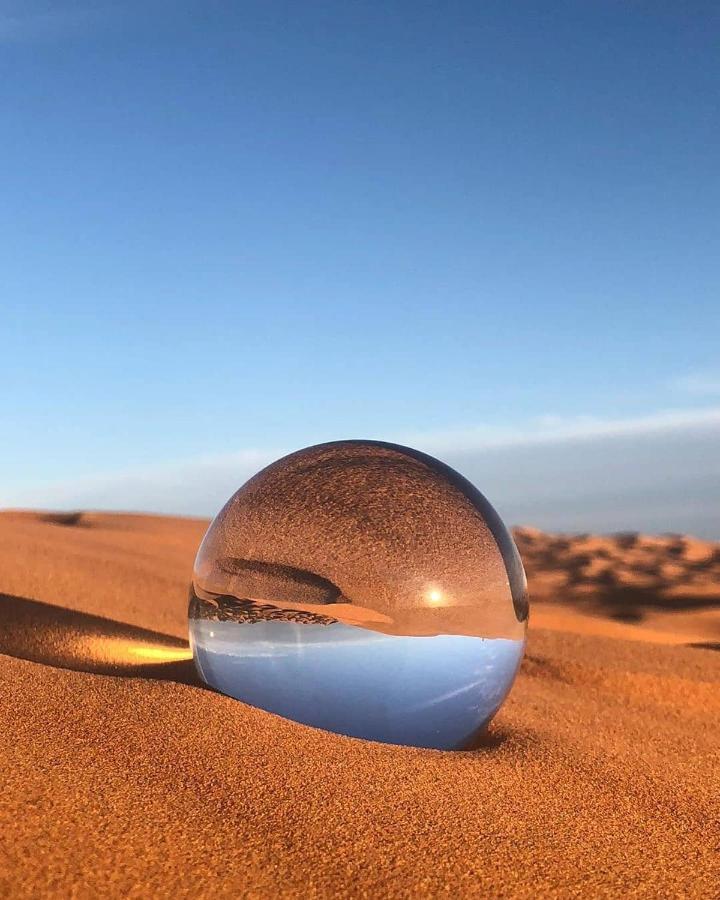 Sahara Majestic Luxury Camp Hotel Мерцуга Екстериор снимка A lensball in the desert