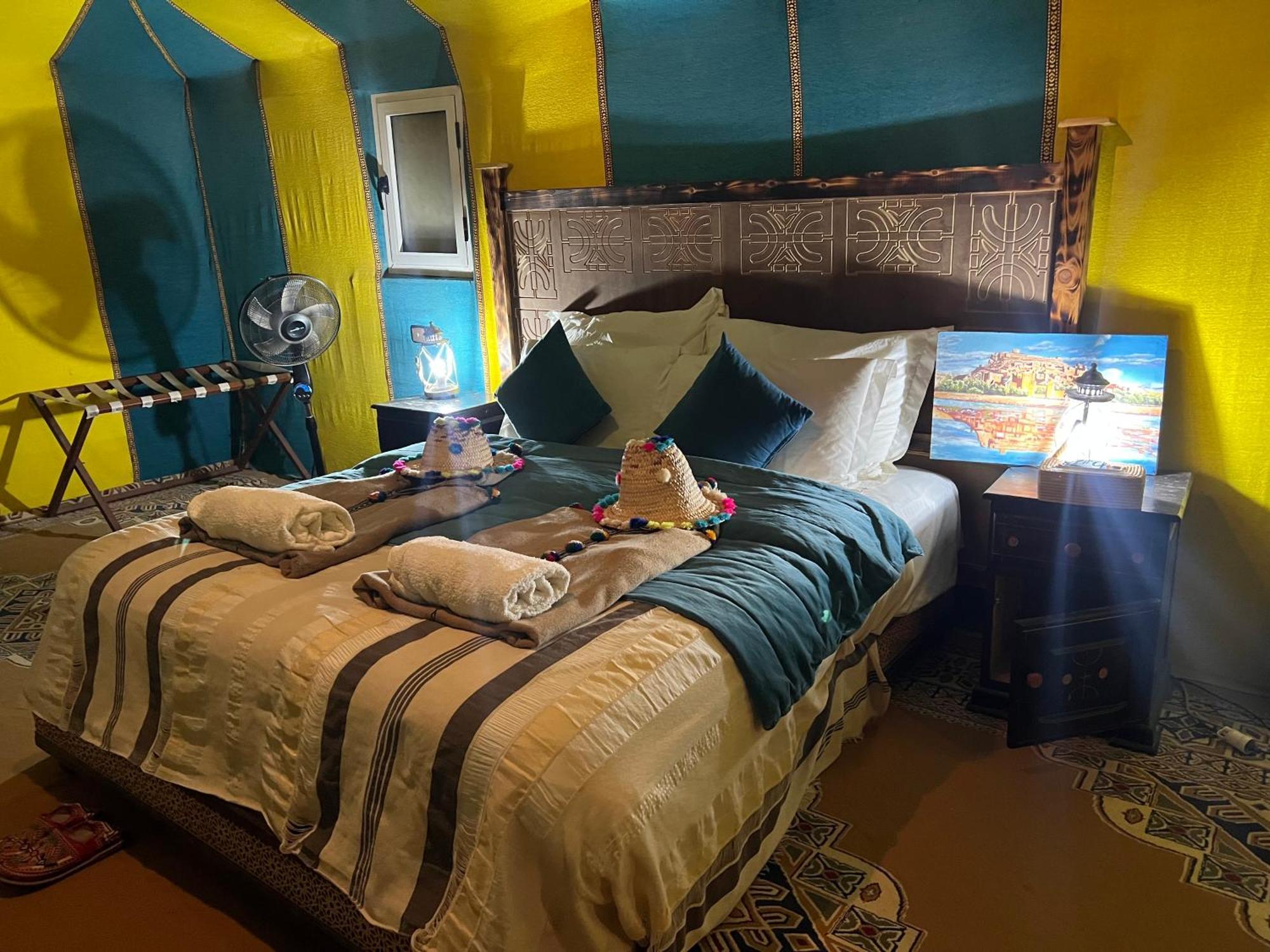 Sahara Majestic Luxury Camp Hotel Мерцуга Екстериор снимка A bedroom in a luxury tent